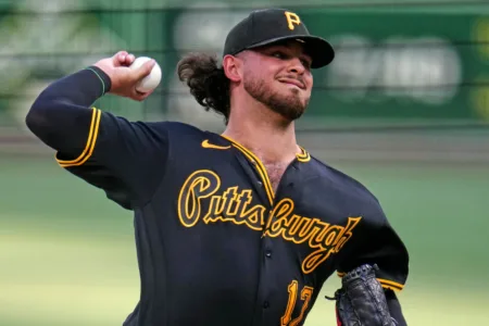NL East-leading Braves break up Pirates' combined perfect-game bid in the 7th on Albies' single